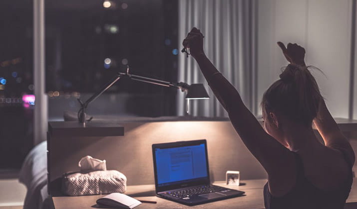 female-working-on-laptop-at-night